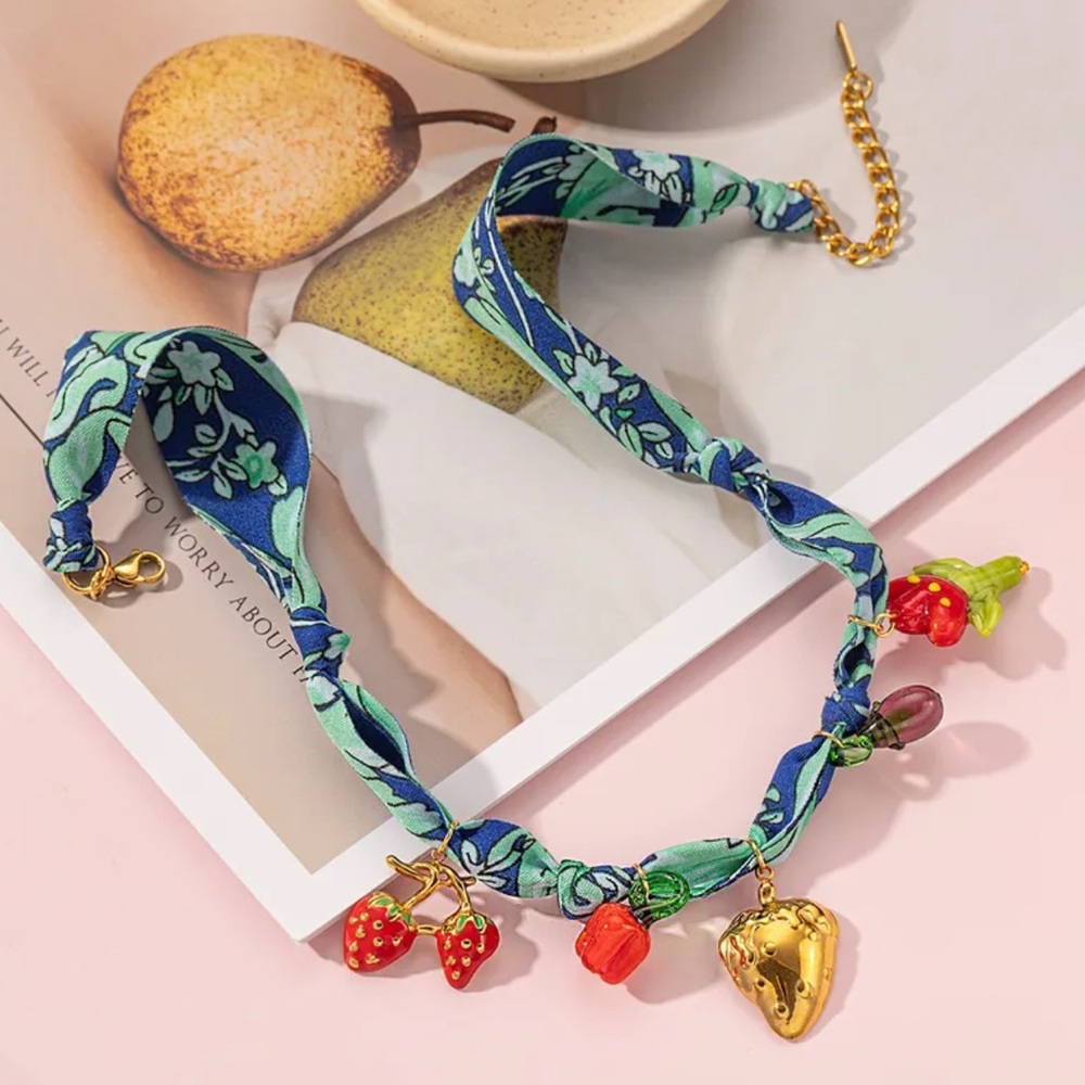 Blue and Green Charm Necklace with Gold Bell